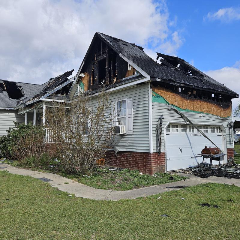 Roof and attic fire damage on residential home