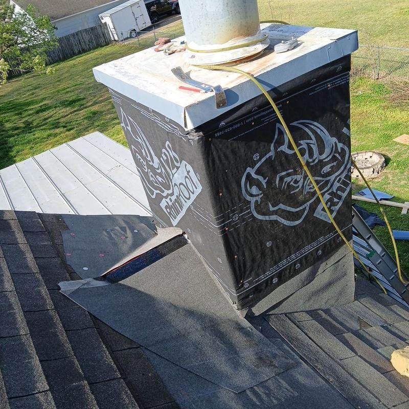 Chimney flashing and waterproof barrier installation