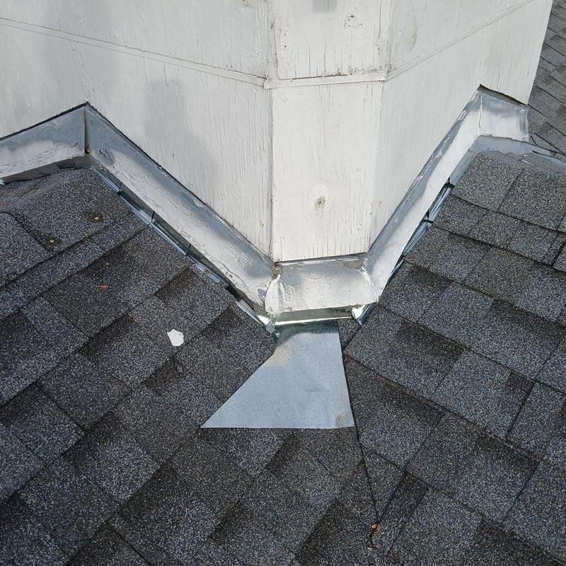 Steeple flashing and shingles on church roof in Memphis