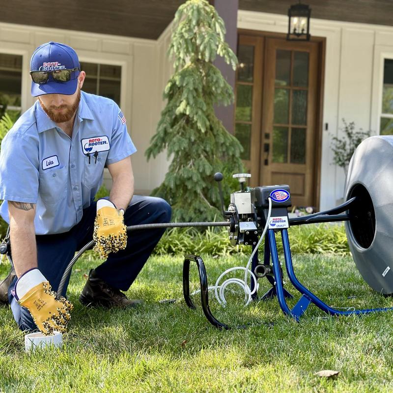 Main sewer line clog cleaning with mechanical auger