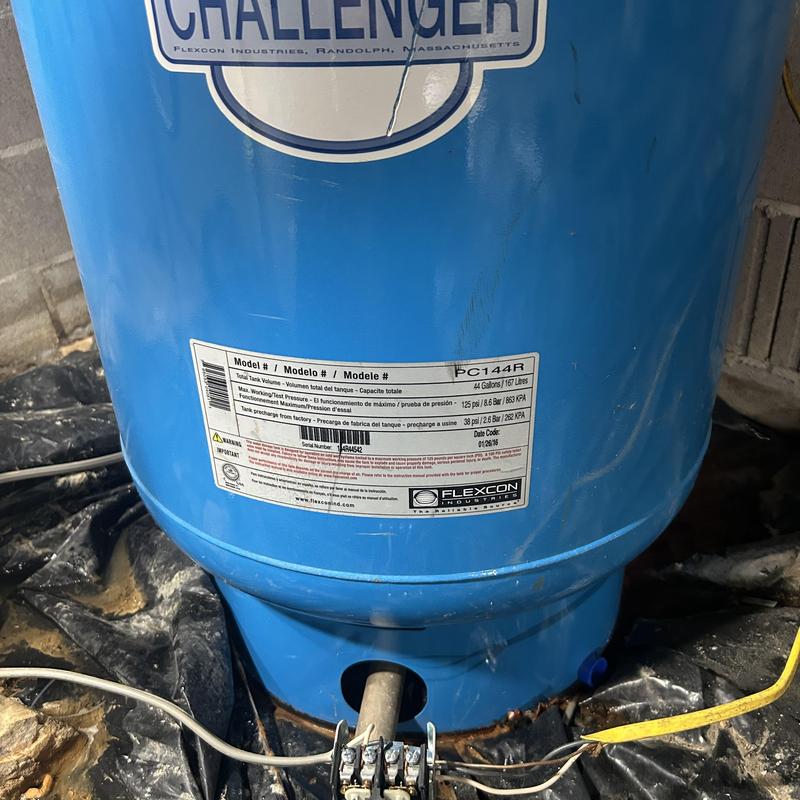 Pressure tank on well pump with wiring connection