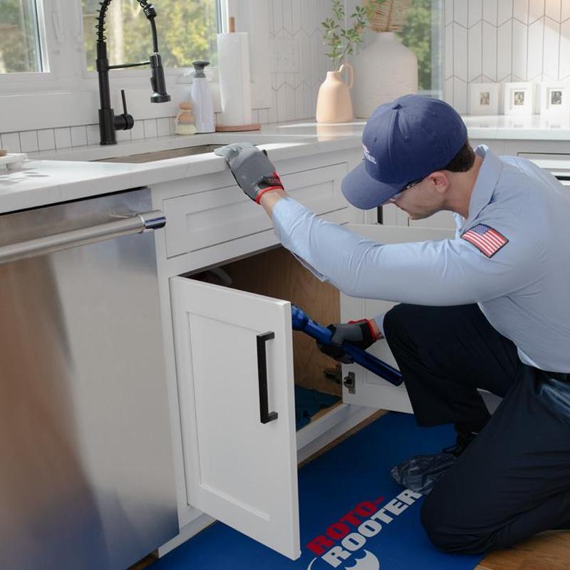 Kitchen sink plumbing clogged under cabinet access