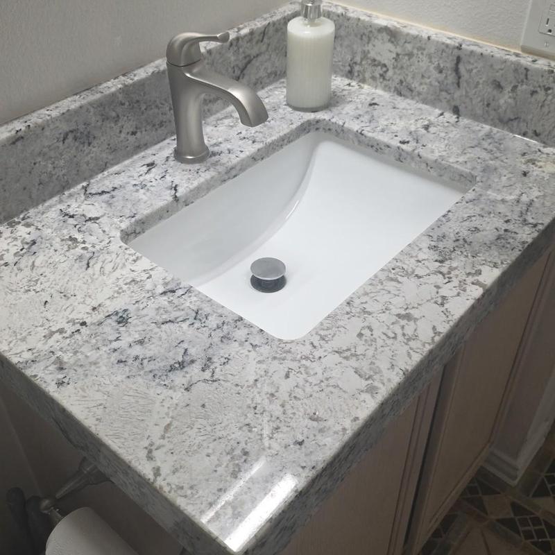 Vanity faucet and granite countertop with undermount sink