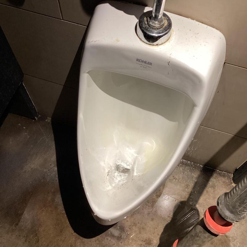 Urinal plumbing with partial water flow and pipe fitting