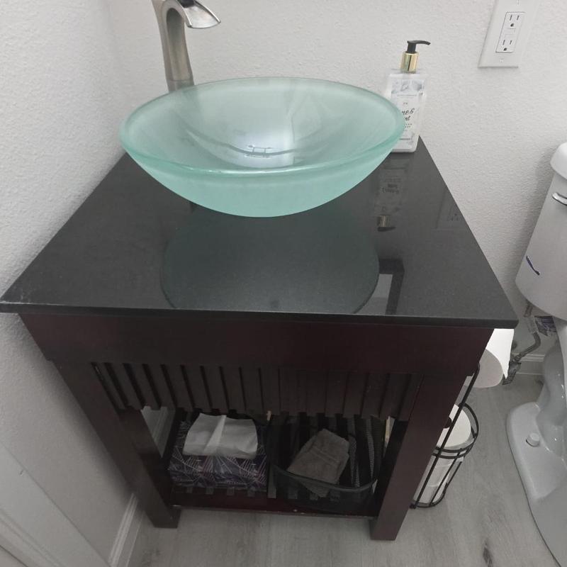 Glass vessel sink and faucet with vanity installation