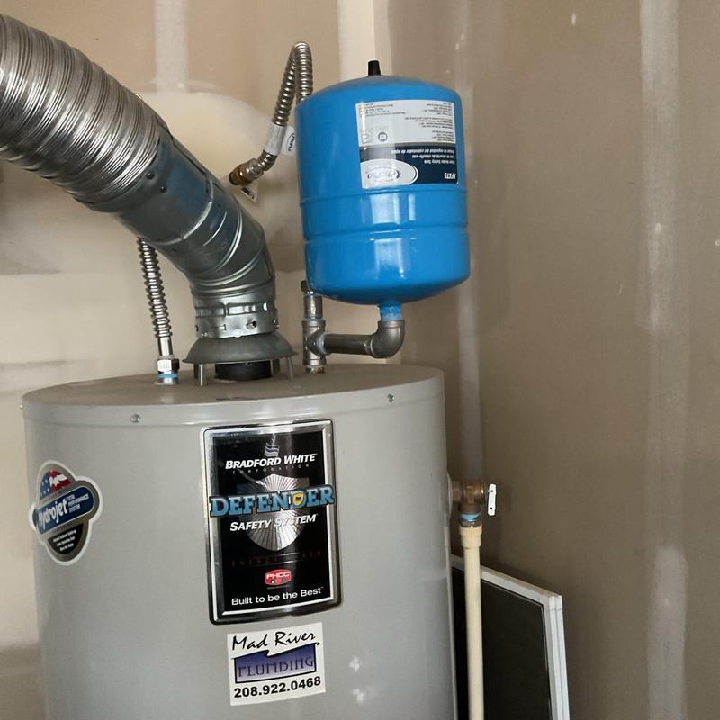 Thermal expansion tank on water heater unit Thermal expansion tank on water heater unit