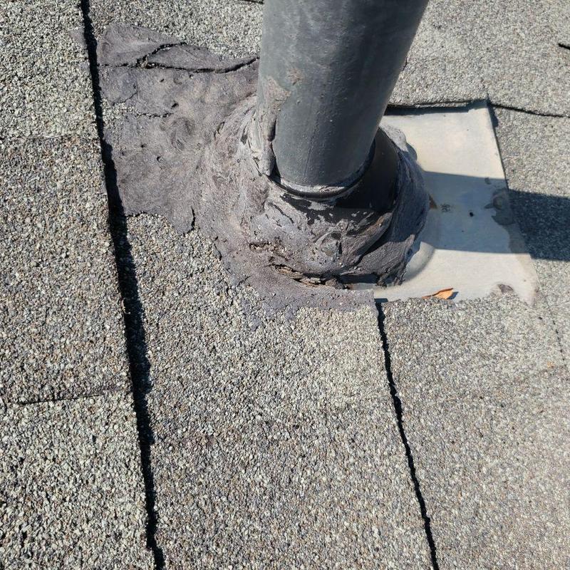 Pipe jack flashing with worn roofing sealant