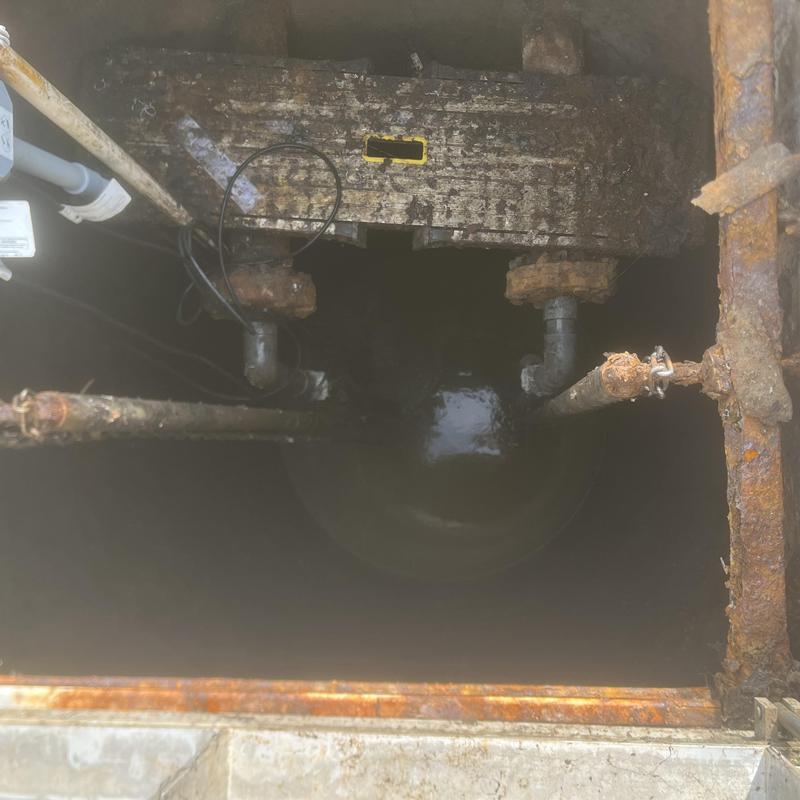 Lift station with rusted, broken support rails Lift station with rusted, broken support rails