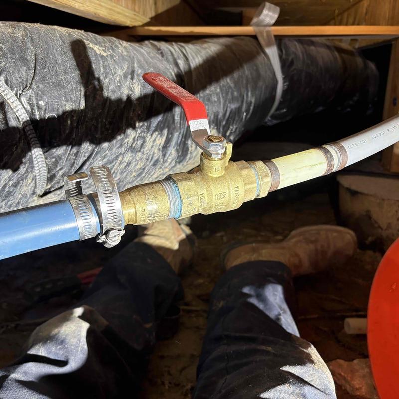 Ball valve and pipe section installation under home Ball valve and pipe section installation under home