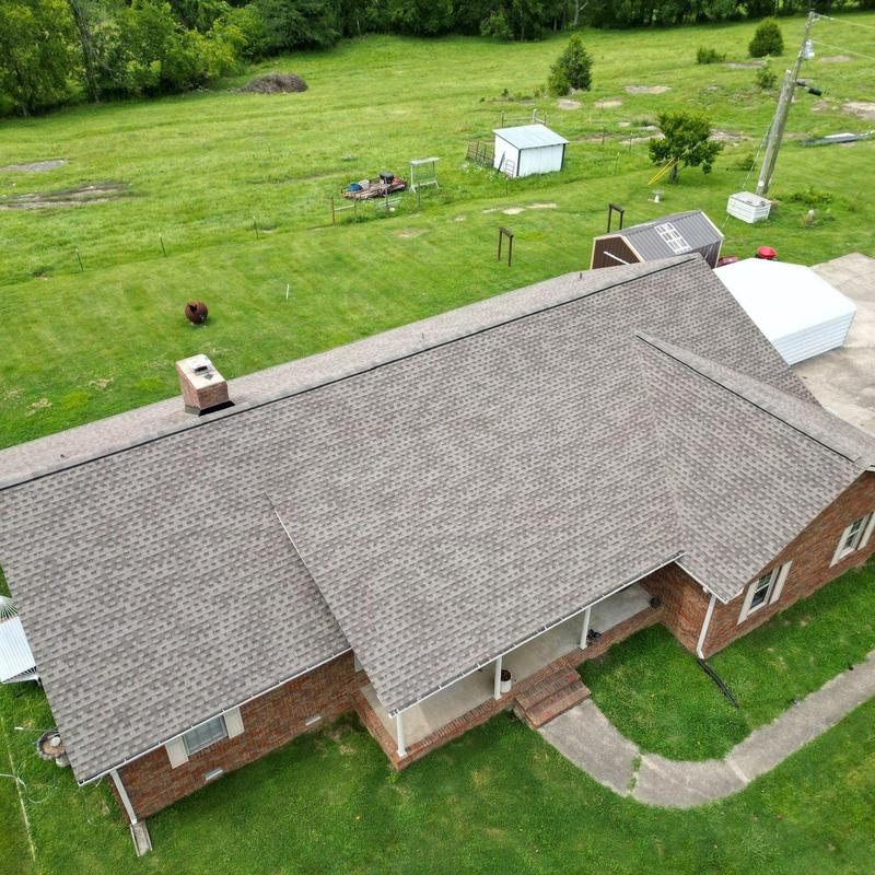 Asphalt shingle roof with hail damage inspection