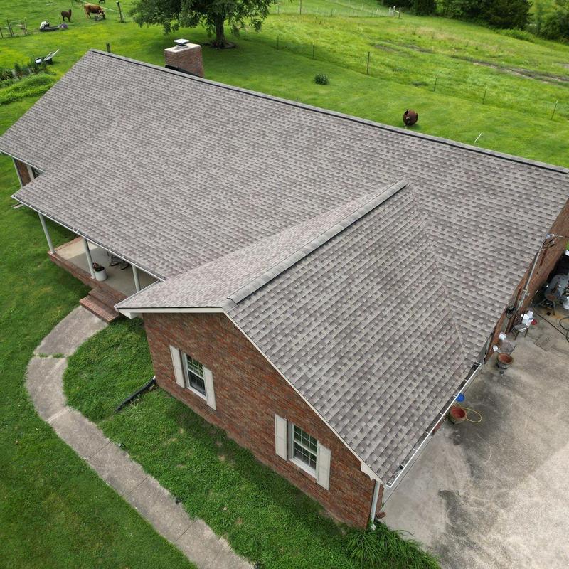 Asphalt shingle roof with hail damage inspection