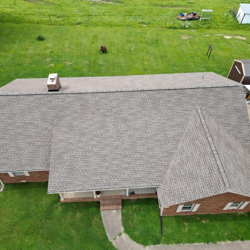 Asphalt shingle roof with chimney and ventilation inspection