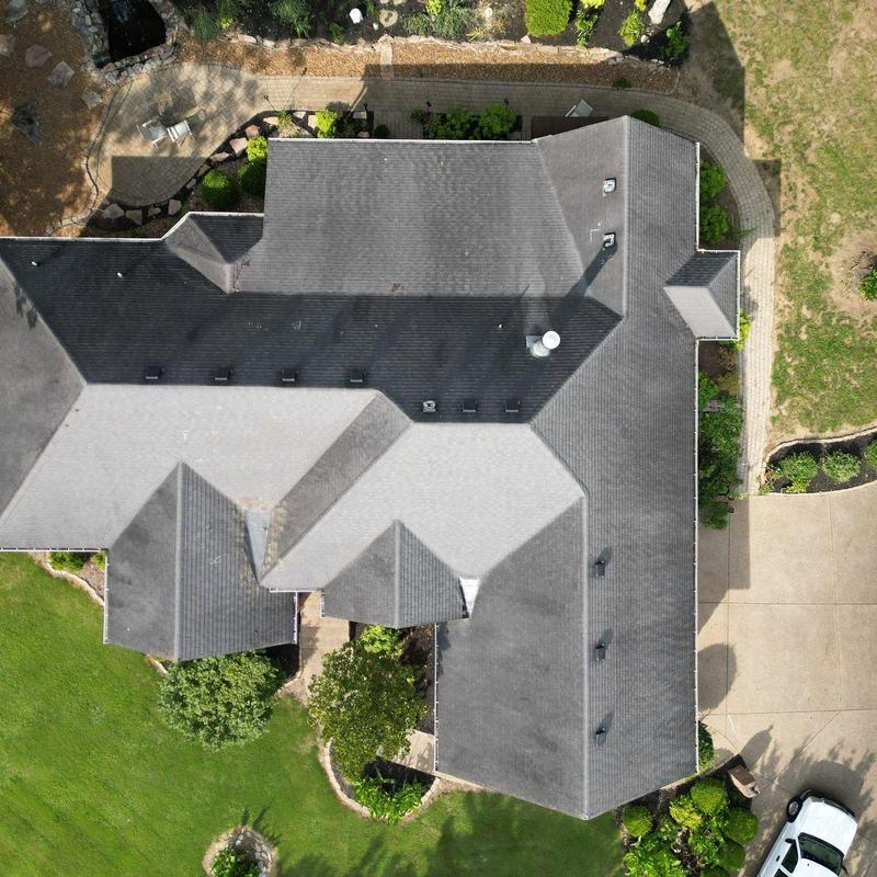 Residential shingle roof with hail and wind damage inspection