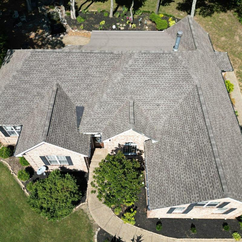 Asphalt shingle roof with hail and wind damage inspection