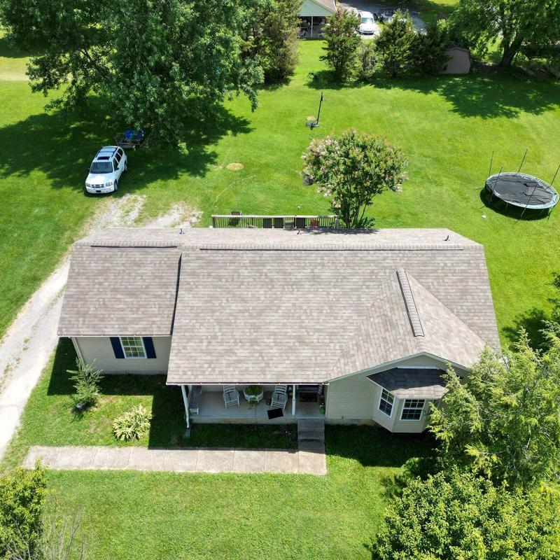 Asphalt shingle roof with wind and hail damage inspection