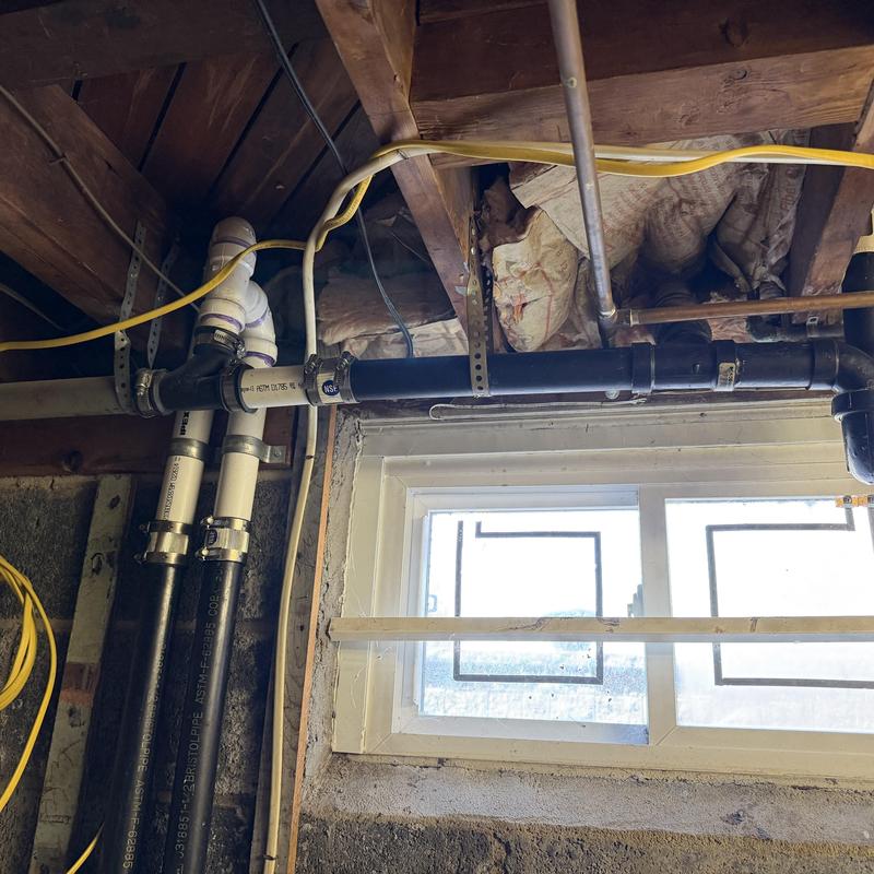 Kitchen secondary drain line with piping and clamps Kitchen secondary drain line with piping and clamps