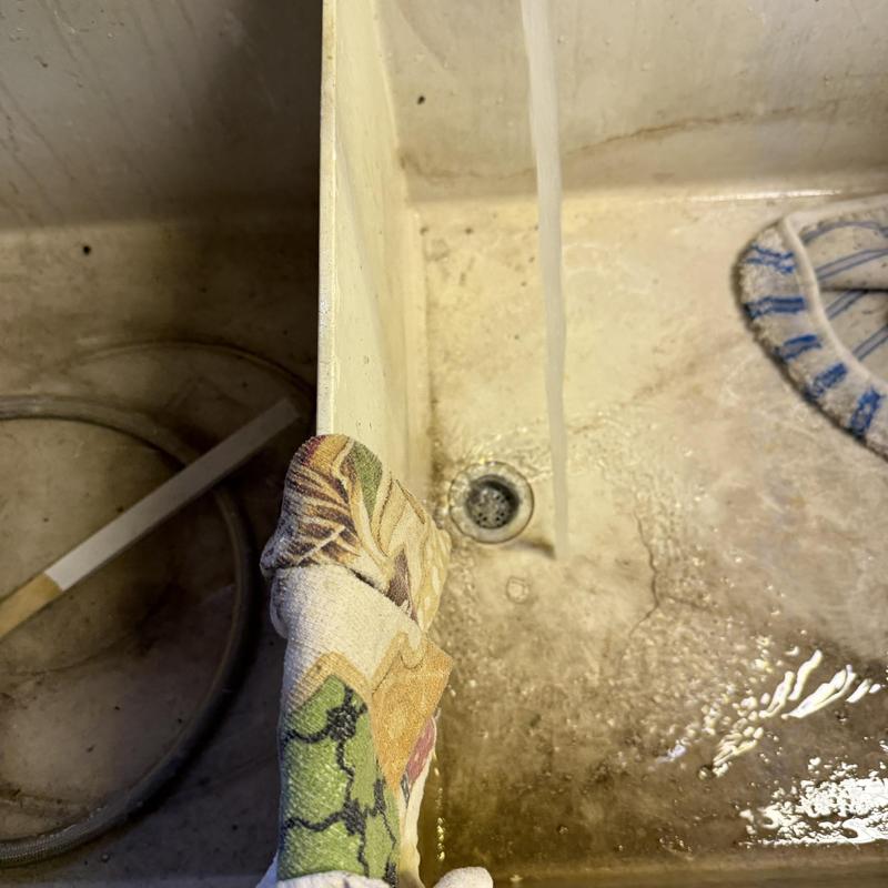 Kitchen utility sink with running water and drain Kitchen utility sink with running water and drain