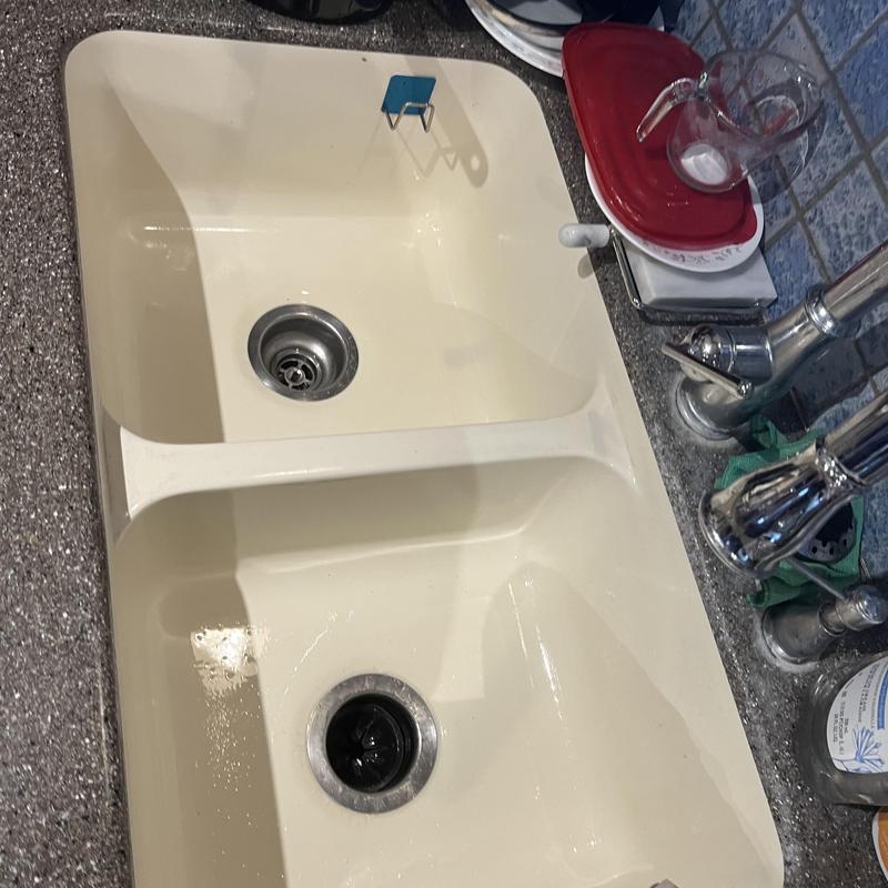 Kitchen sink drain with clear water flow and clean surface Kitchen sink drain with clear water flow and clean surface