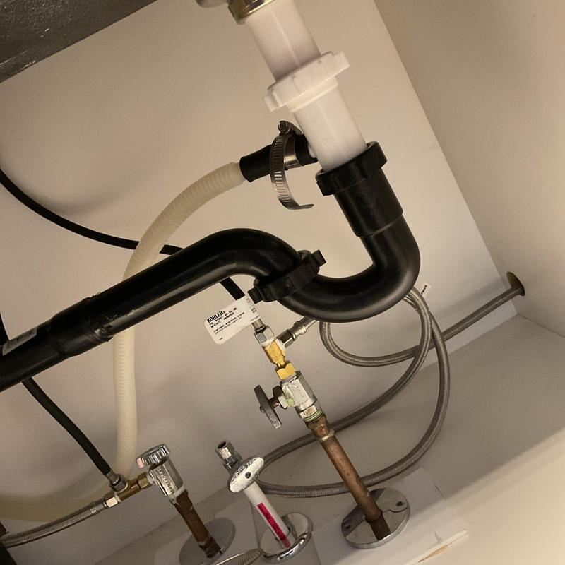 Sink drain slip joint and connections under cabinet Sink drain slip joint and connections under cabinet