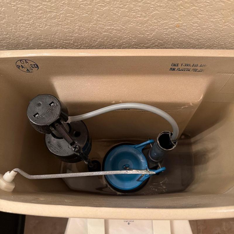 Toilet tank components with new flapper and valve parts