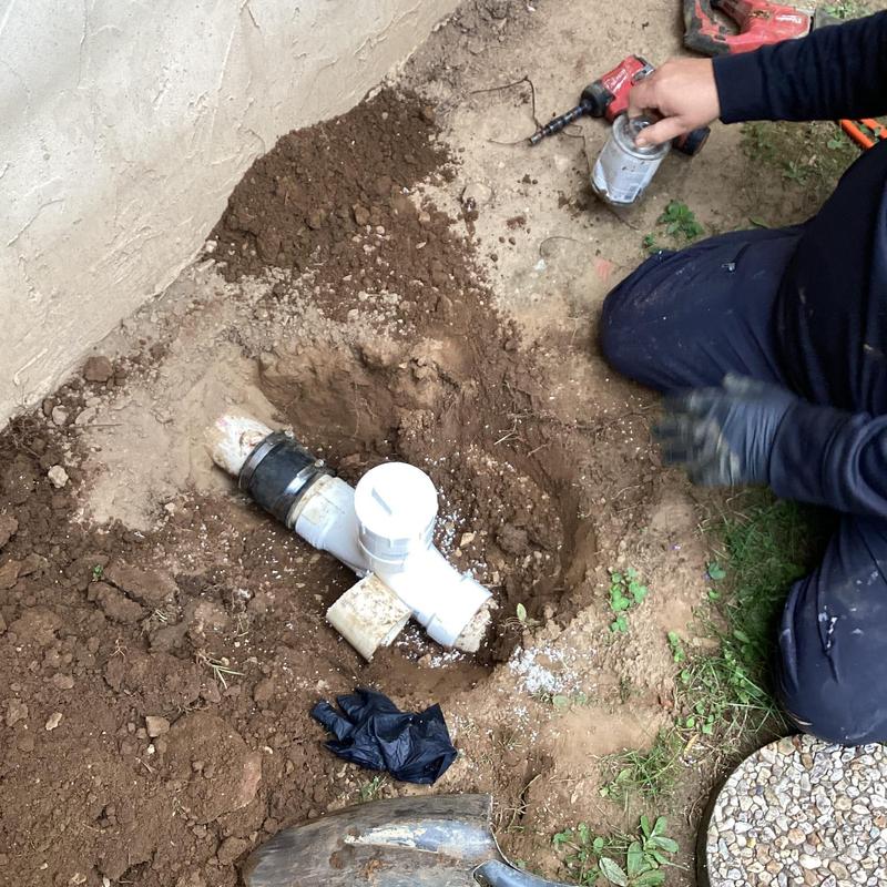 2-way cleanout installation in outdoor soil area