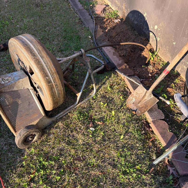 Drain snake machine with outdoor plumbing access digging tools