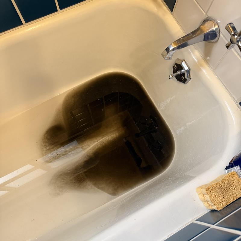 Bathtub drain with black water backing up