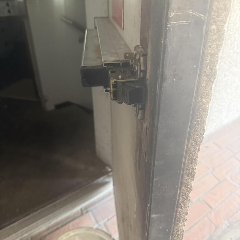 Electric door lock mechanism on commercial door frame