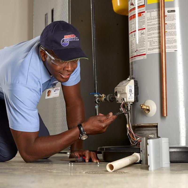 Water heater pilot light inspection and adjustment