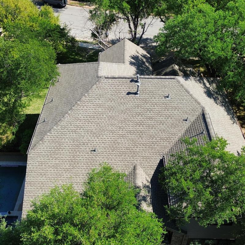 GAF Weatherwood shingle roof with new gutters and vents