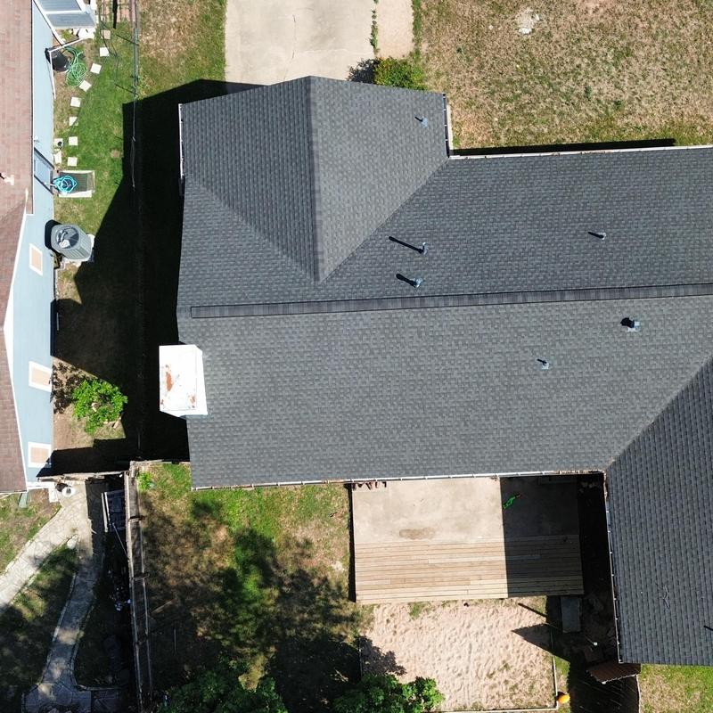 Charcoal GAF 30-year shingle roof installation aerial view