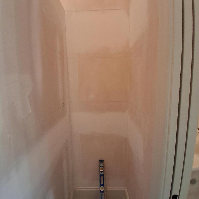 Baseboard and quarter round installation in narrow closet space