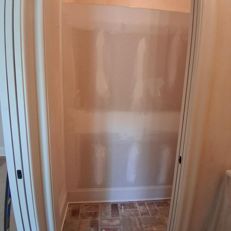 Baseboard and quarter round installation in closet nook