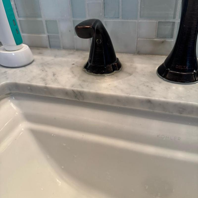 Wide-spread bathroom faucet cartridge replacement and p-trap cleaning Wide-spread bathroom faucet cartridge replacement and p-trap cleaning