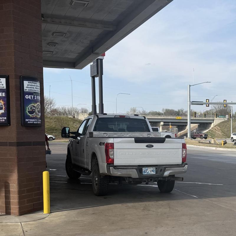 Truck door lock unlocking at gas pump station