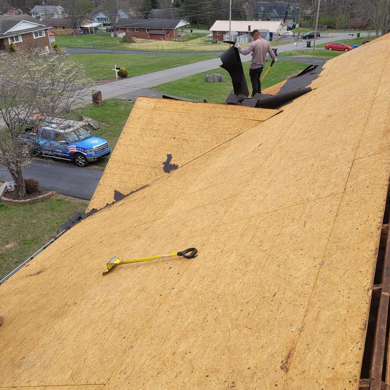 Roof decking removal with protective underlayment installation