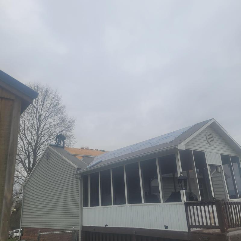 Atlas shingle roofing system installation on house roof