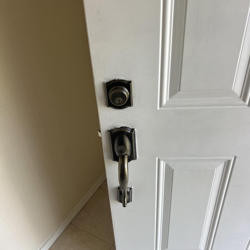 Front door lockset with deadbolt in white door
