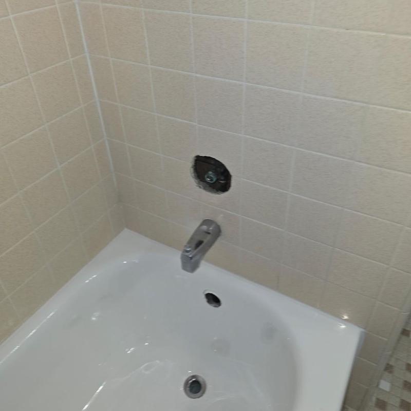 Tub and shower diverter valve missing from wall