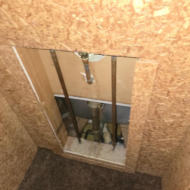 Tub and shower pipes exposed for diverter replacement