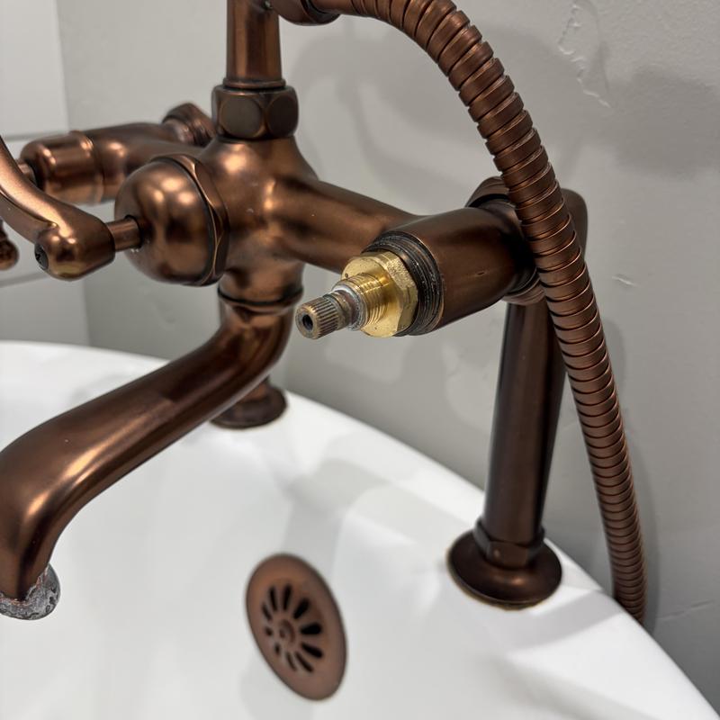 Tub faucet valve stem and bronze fixture Tub faucet valve stem and bronze fixture