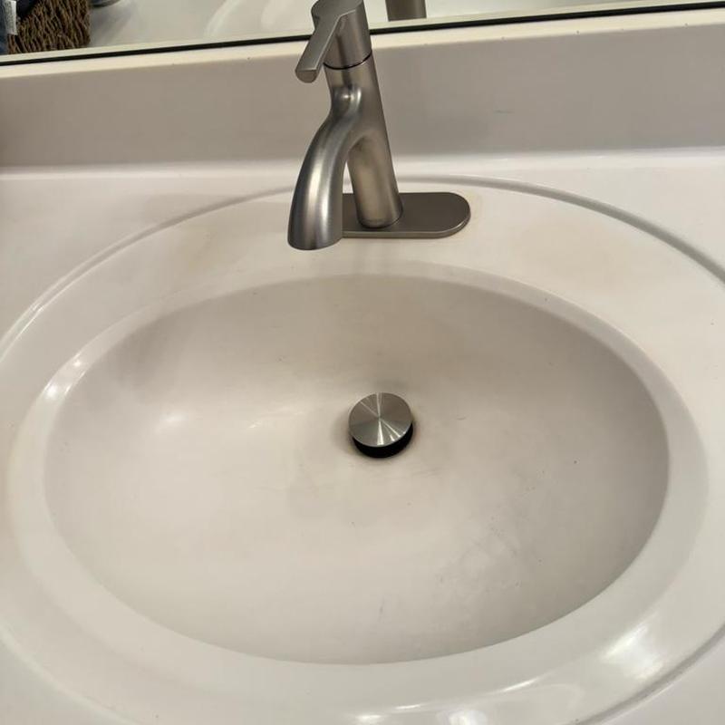 Bathroom faucet with pop-up drain and countertop