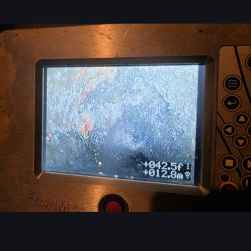 Sewer pipe collapse visible on inspection camera screen