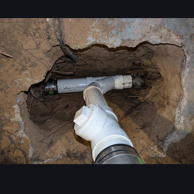 PVC sewage line replacement under concrete floor hole