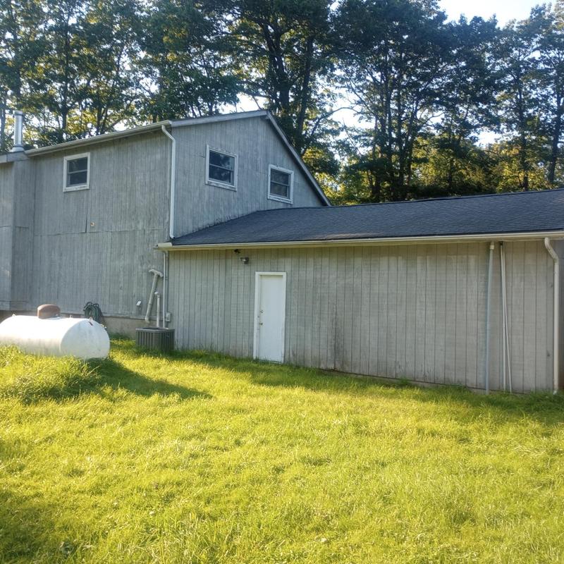 Asphalt shingle roof inspection on residential building
