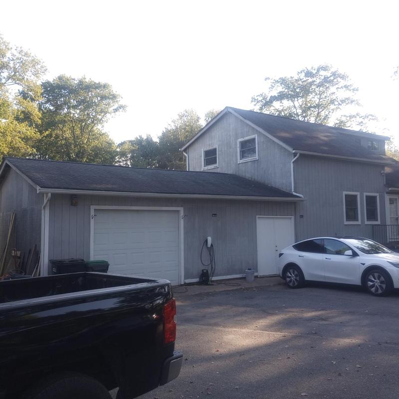 Asphalt shingle roof inspection and measurement on house