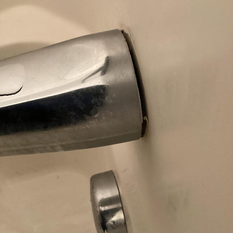 Bathtub spout loose with gap at wall connection