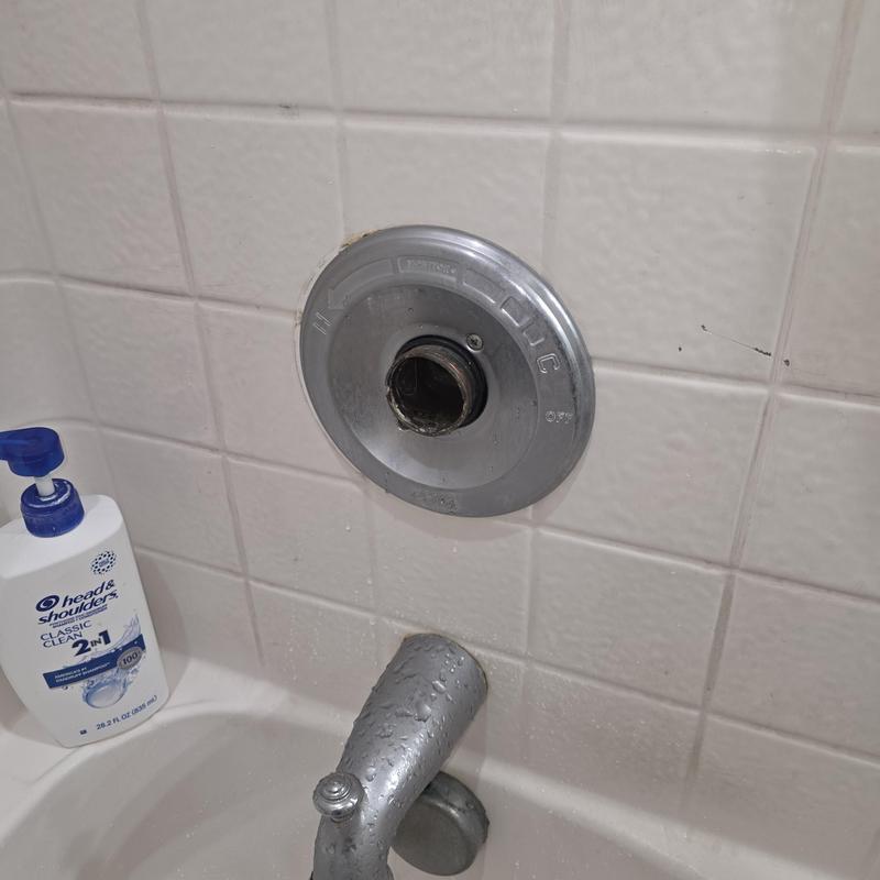 Delta tubshower cartridge replacement area in tiled wall