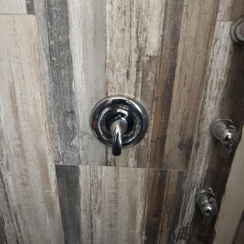 Moen shower valve installation on wood panel wall
