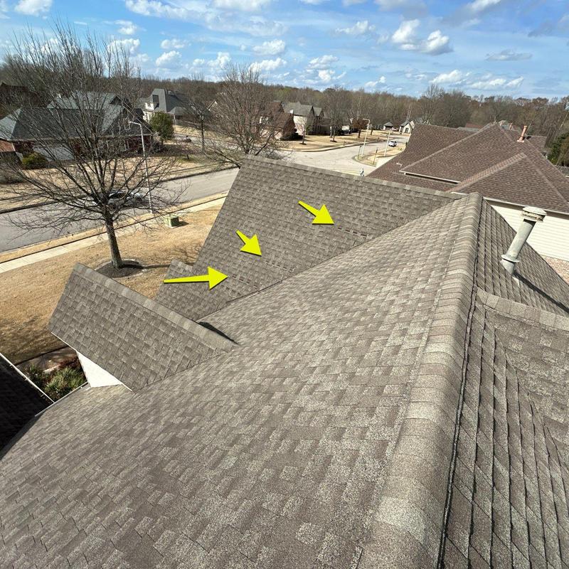 Owens Corning Oakridge asphalt shingle roof with storm damage
